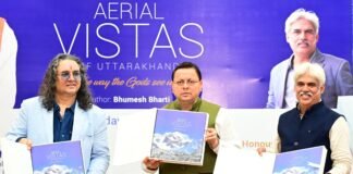 Dehradun:-मुख्यमंत्री पुष्कर सिंह धामी ने किया फोटोग्राफर भूमेश भारती की कॉफी टेबल बुक एरियल विस्टाज़ ऑफ उत्तराखंड का विमोचन
